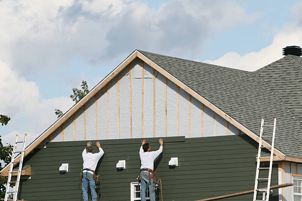 Professional Emergency Siding Repair technician working in Danville, OH